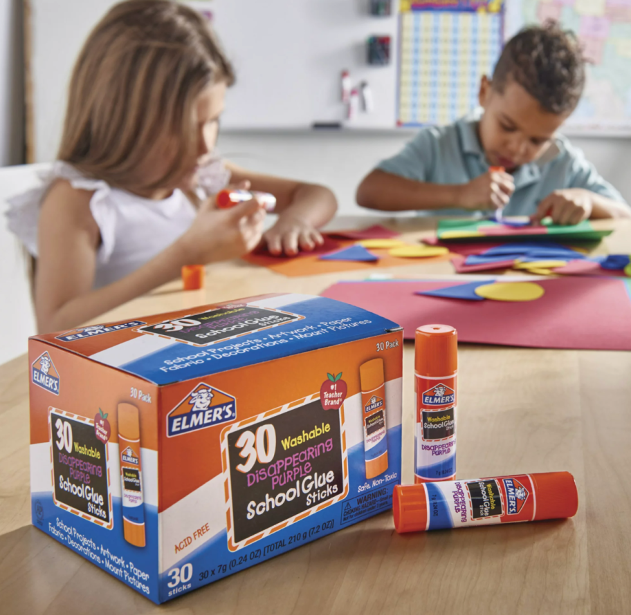 Kids using Elmer's Purple Glue sticks