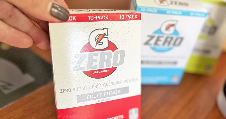 hand holding a box of Gatorade Zero Powder packets
