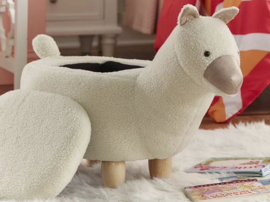 a llama shaped storage ottoman on a rug in a living room