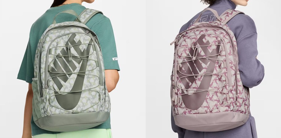 two women with matching green and purple nike backpacks