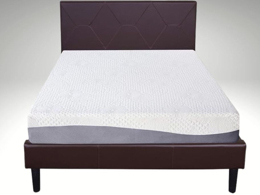 Olee Sleep 10 Inch Gel Layer Top Memory Foam Mattress on bed frame stock photo