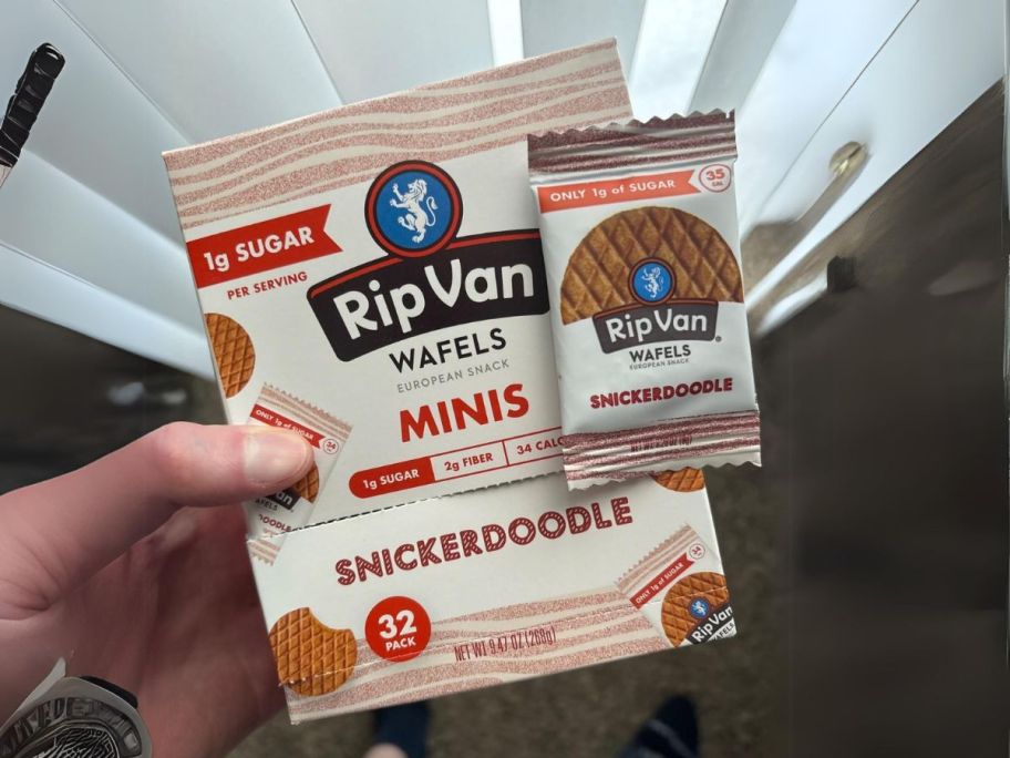 hand holding Rip Van Wafels Snickerdoodle Mini Stroopwafels 32-Pack