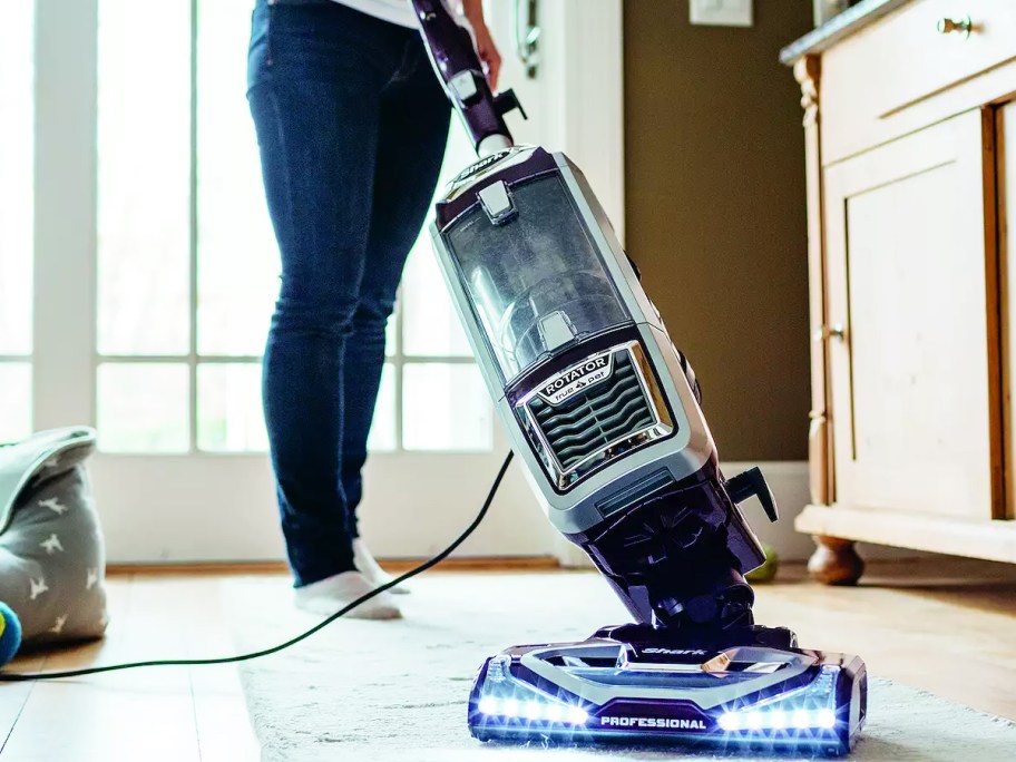 vacuuming floor with Shark Rotator Vacuum
