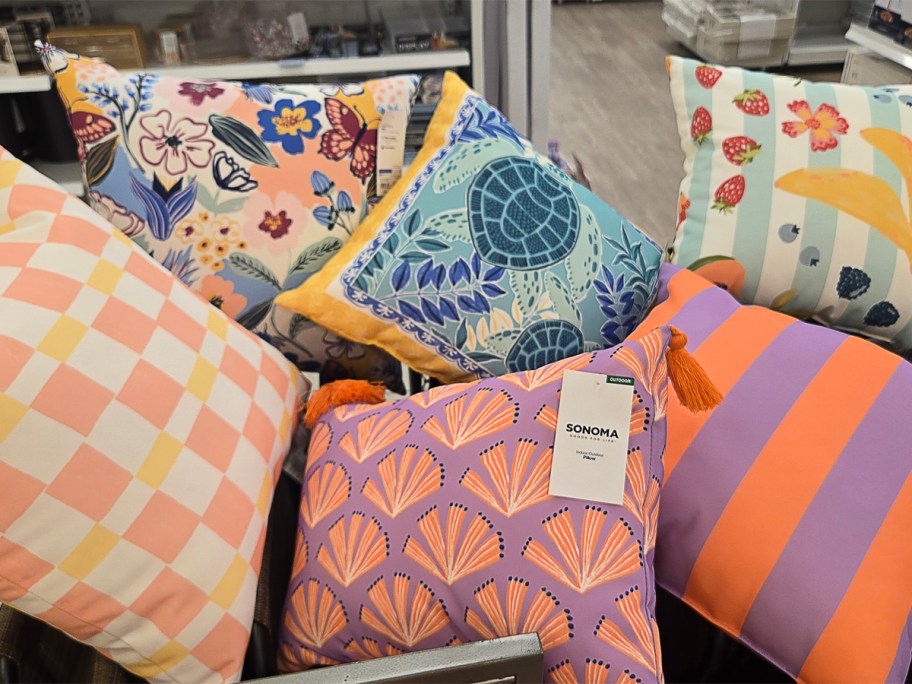 Assortment of Sonoma Goods for Life Indoor Outdoor Pillows in different prints in a kohl's store