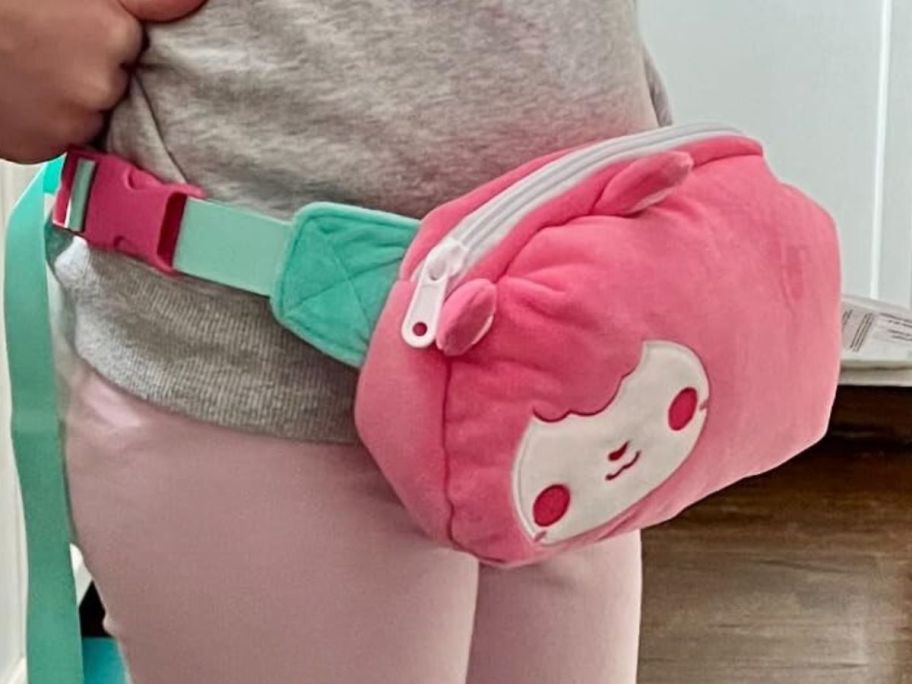 girl wearing TeeTurtle Plushiverse Sheep Plushie Fanny Pack around her waist