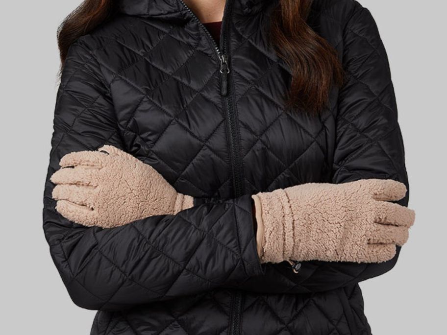 Woman wearing fleece gloves