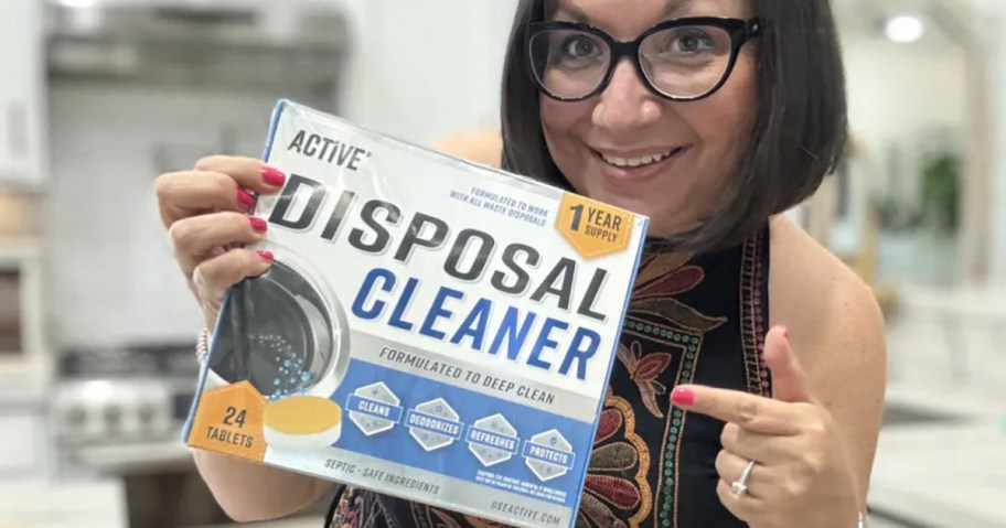 woman holding active disposal cleaner box