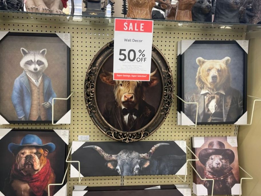 animal gentleman wall art hanging in store