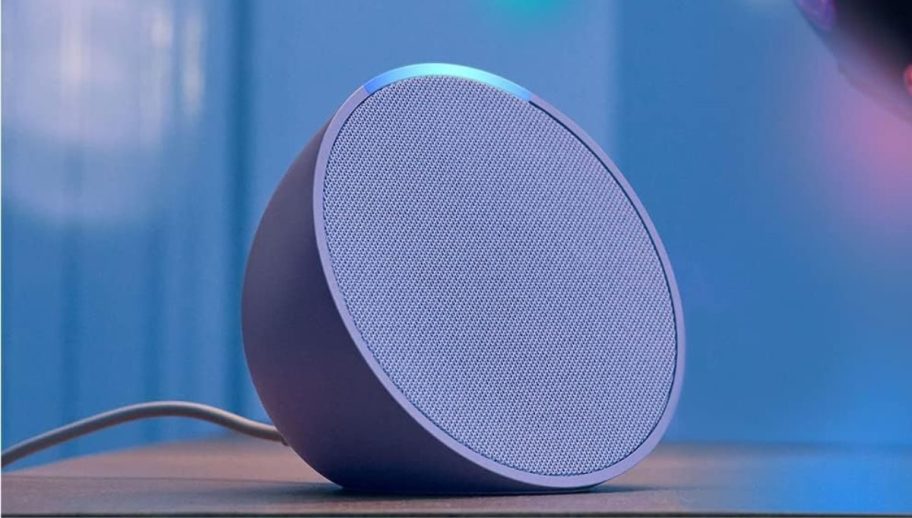 Lavender echo pop speaker on wooden table