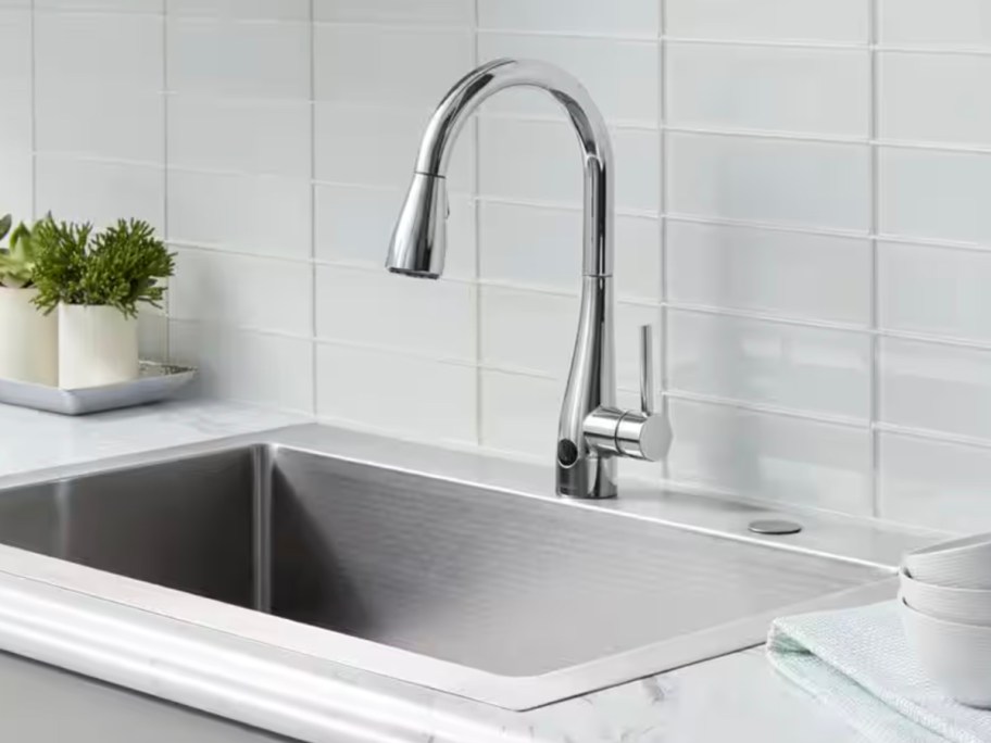 stainless steel kitchen faucet and sink in kitchen