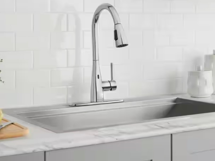 stainless steel kitchen faucet and sink in kitchen