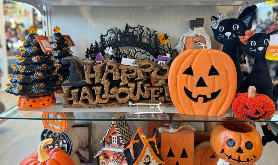 a selection of halloween decor items on a store shelf