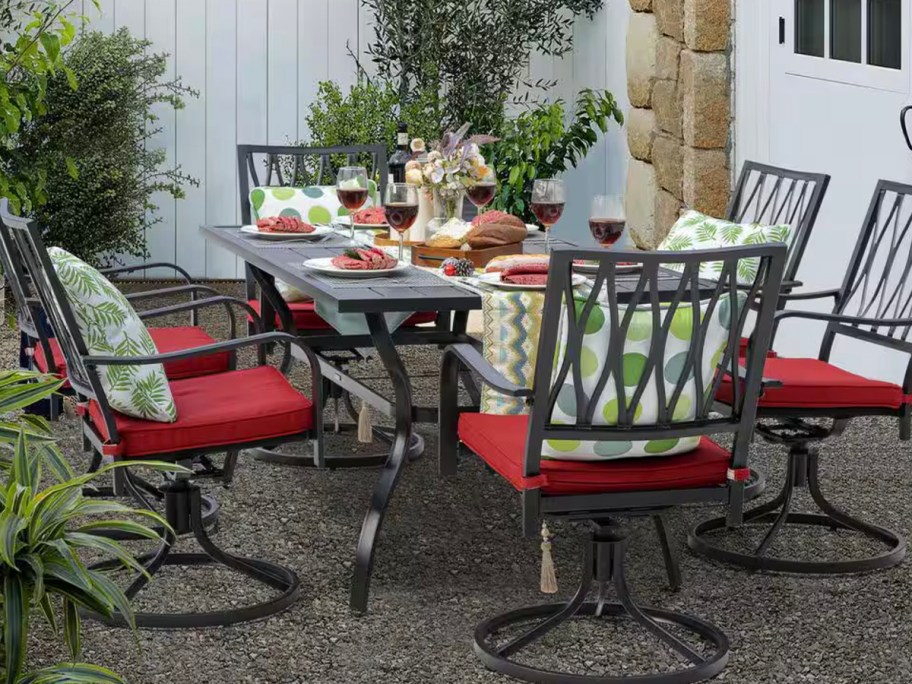 red and black dining set on patio