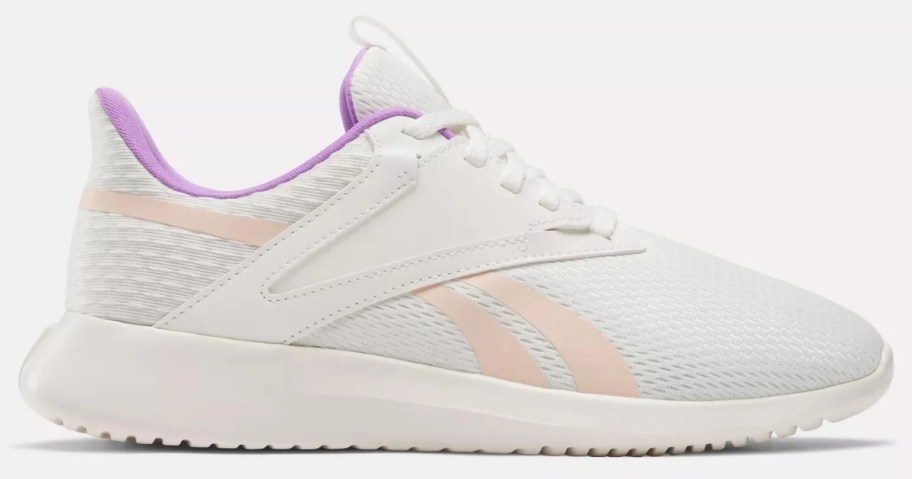 women's white Reebok athletic shoe with pink and purple accents