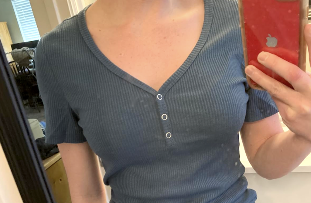 woman wearing ribbed v neck top 