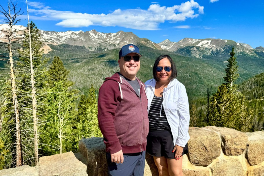 two people standing in rocky mountain national park