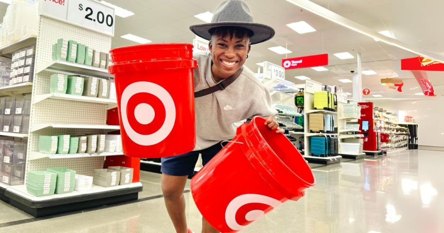 woman holding 2 target 5 gallon buckets in store