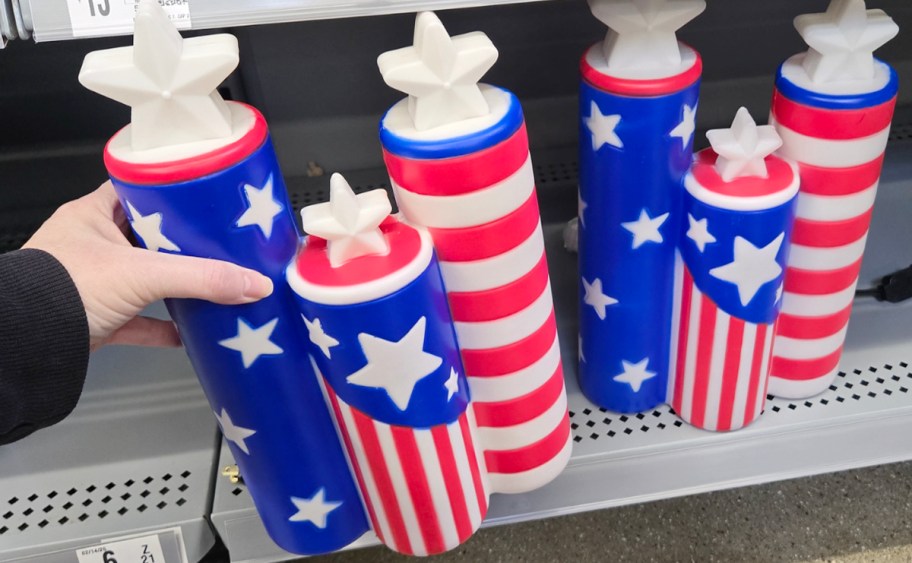 hand holding patriotic candle blow mold 