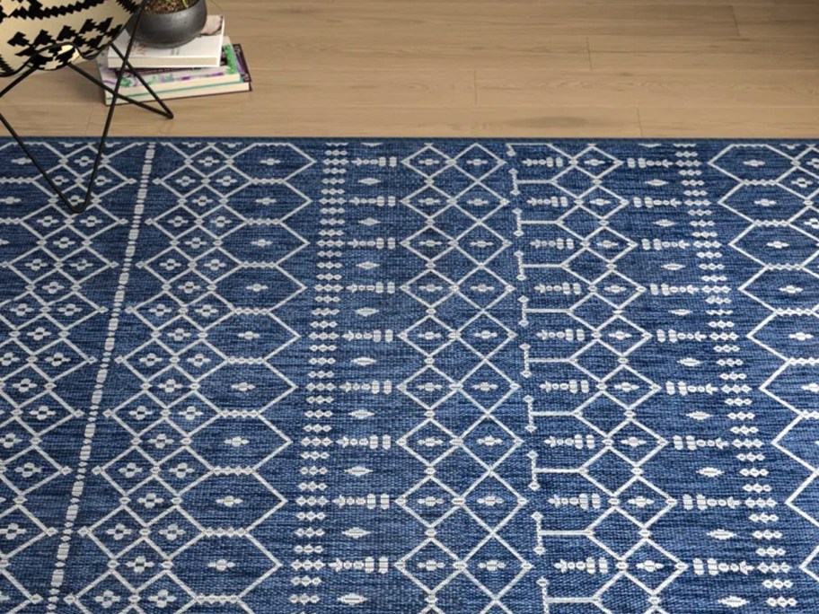 blue and white area rug with pattern 