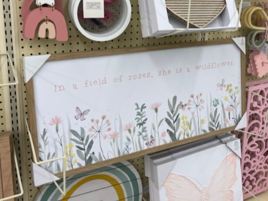 She Is A Wildflower Wood Wall Art hanging in store