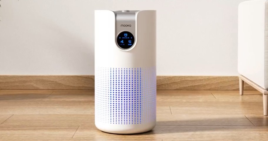 white MOOKA brand HEPA air purifier in a living room