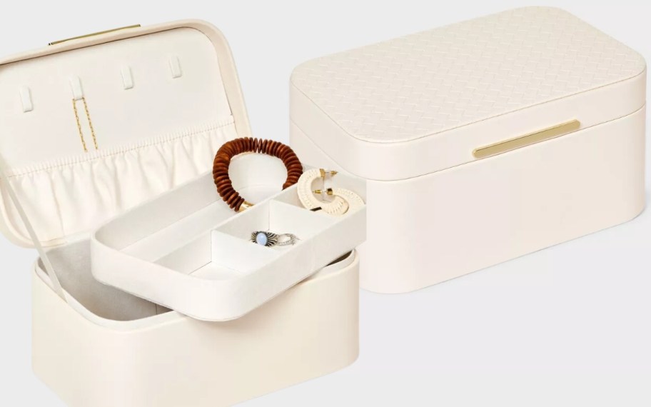 cream color leather jewelry organizer case shown open and closed