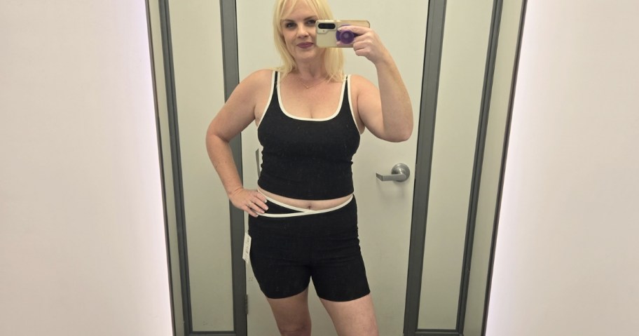 woman wearing Athletic Works ButterCore Tipped Bike Shorts and Top