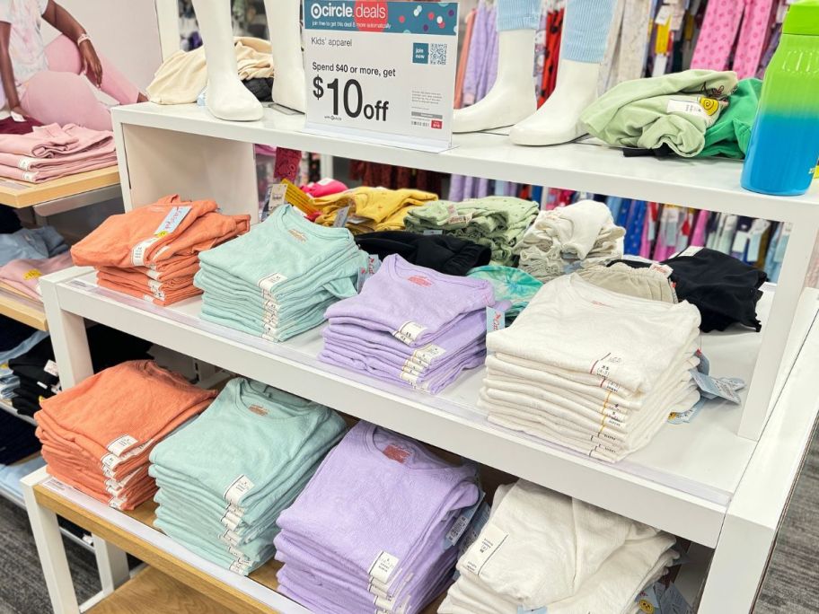 A display of Cat & Jack Girls Tops at Target