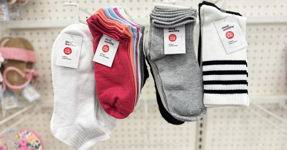 packs of women's socks on store display