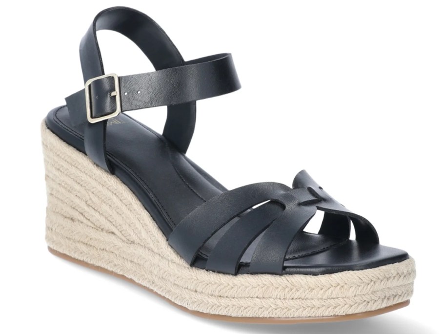 a women's black and raffia platform espadrille style sandal