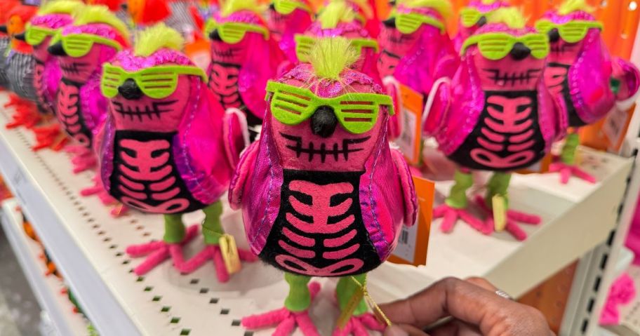 A shelf-full of Halloween-themed decorative birds at Target