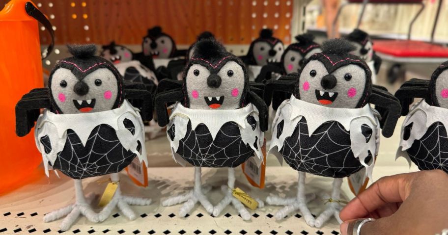 A shelf-full of Halloween-themed decorative birds at Target