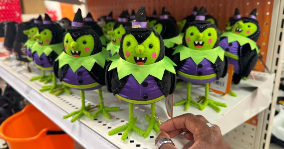 A shelf-full of Halloween-themed decorative birds at Target