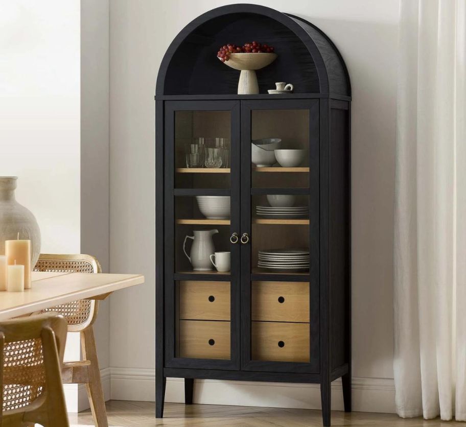 A Modway Nolan Arched Display Cabinet in a living room