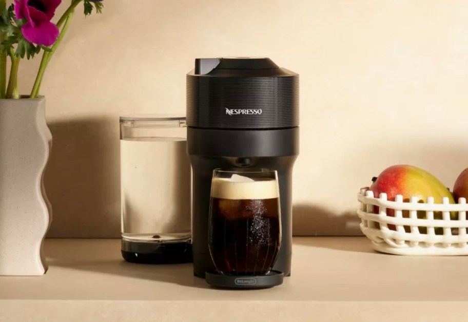 Nespresso Vertuo Pop+ Combination Espresso and Coffee Maker with Milk Frother on counter