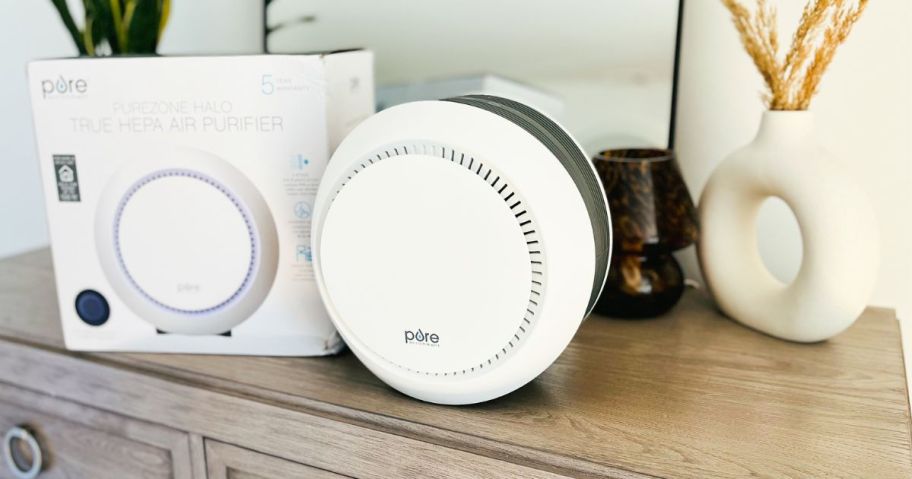 A Pure Enrichment Air Purifier on a dresser