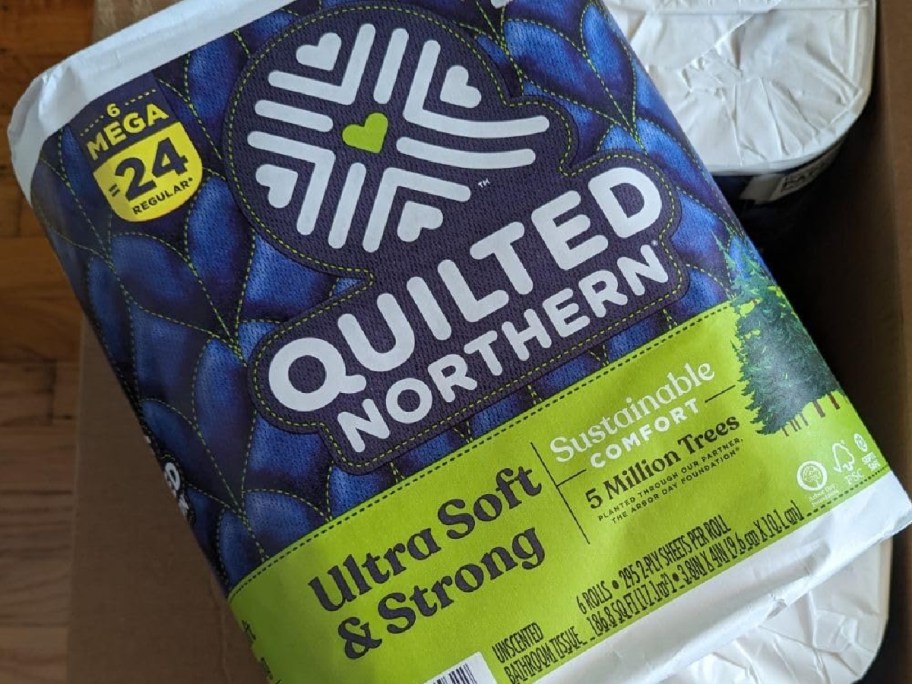 Quilted-Northern-Ultra-bathroom-paper-mega-rolls-displayed-on-top-of-a-bunch-of-other-toilet-paper