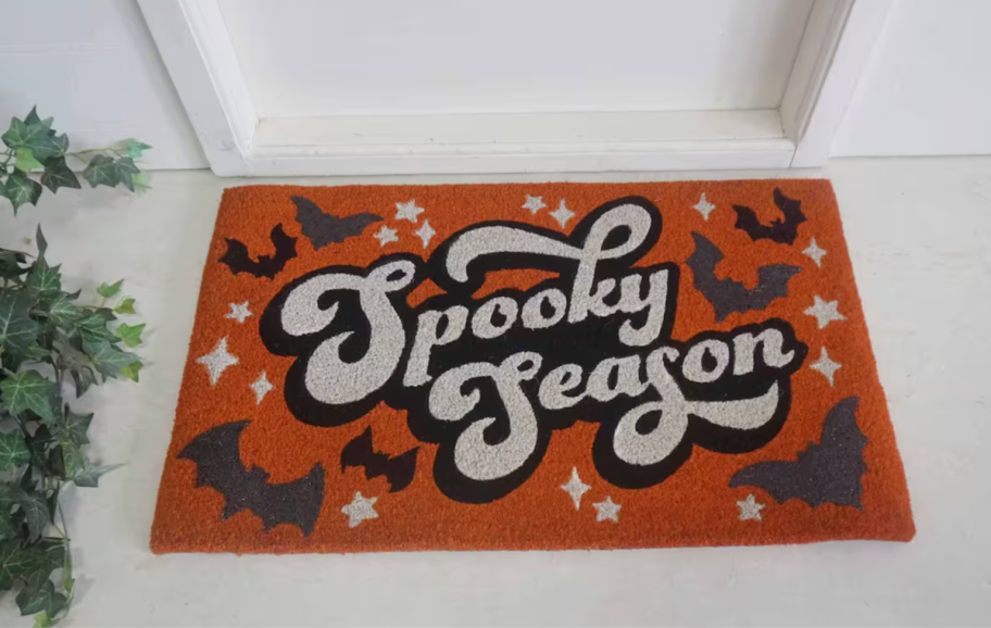 Halloween Front Doormat that says Spooky Season
