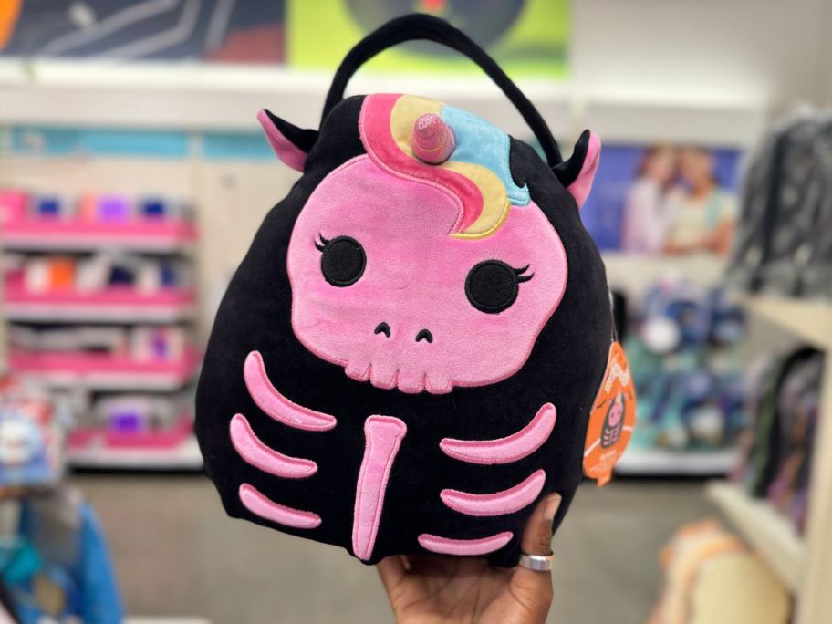 Squishmallows Sketlana the Skeleton Halloween Treat Pail in hand in store