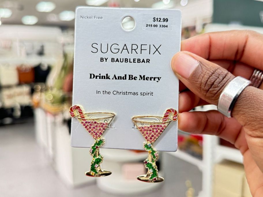 SugarFix by BaubleBar Drink & Be Merry Earrings in hand in store