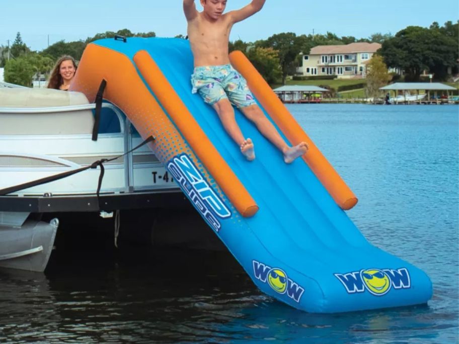 A child on an inflatable slide