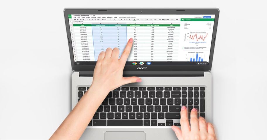 person pointing to screen of Acer Chromebook