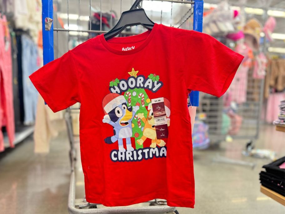 Bluey Hooray Christmas Girls Graphic Short Sleeve T-Shirt hanging in store