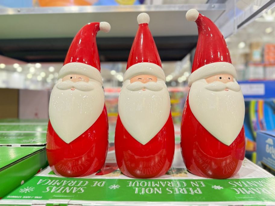 ceramic santa 3 pack on display in a costco store