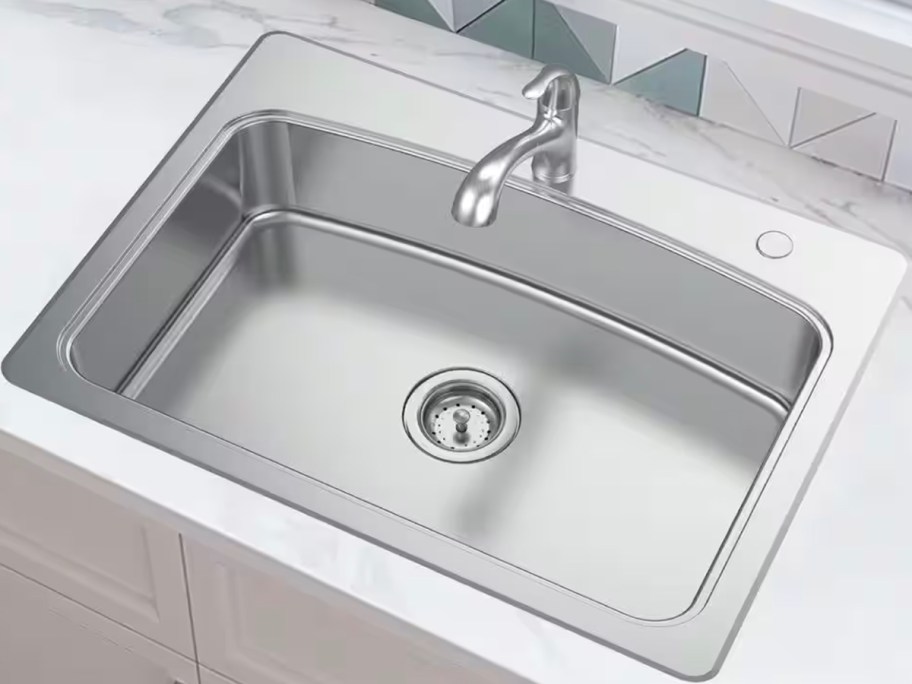 stainless steel kitchen faucet and sink in kitchen