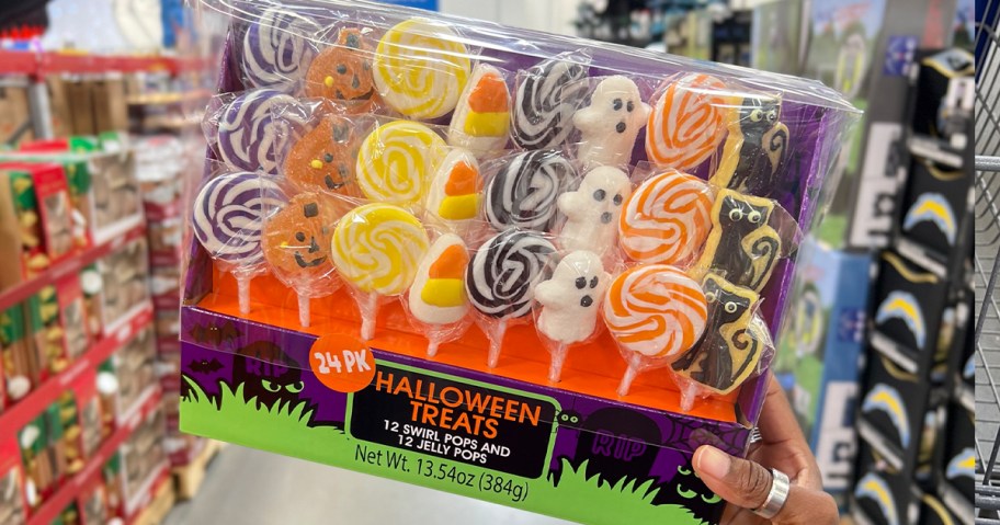 hand holding halloween 24 count pops 