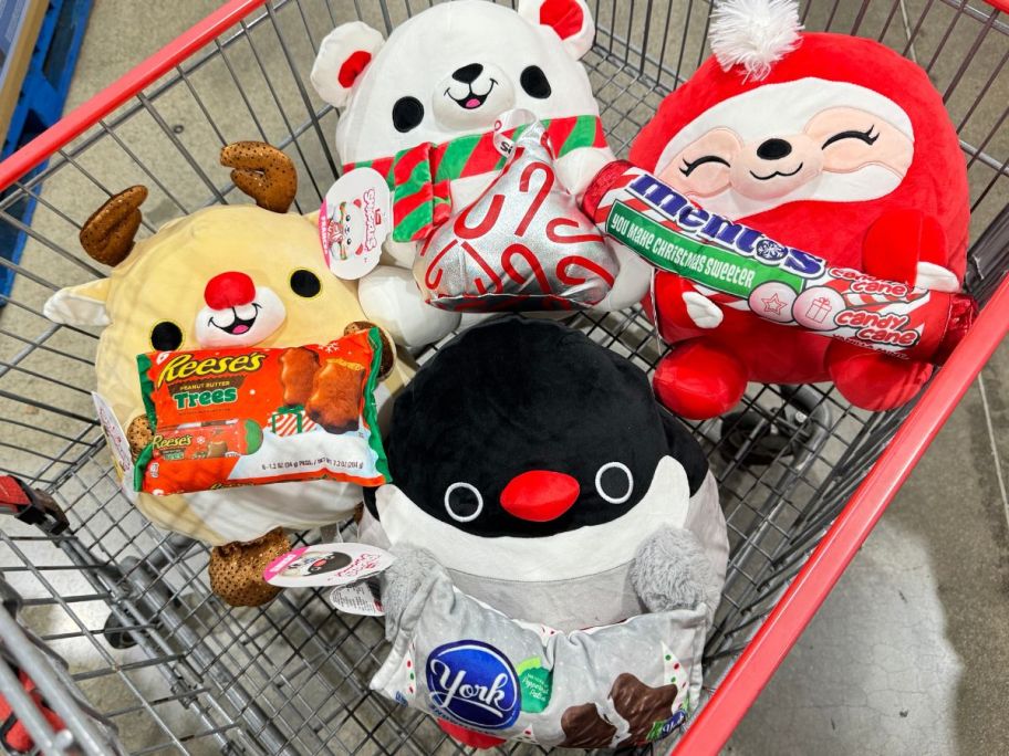 four holiday snackle plushes in a costco cart