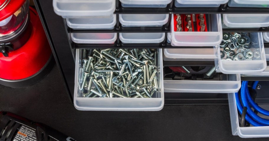 drawers open to show screws and other small hardware items