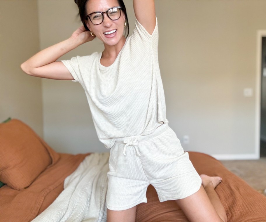 woman in light beige waffle shirt and shorts 