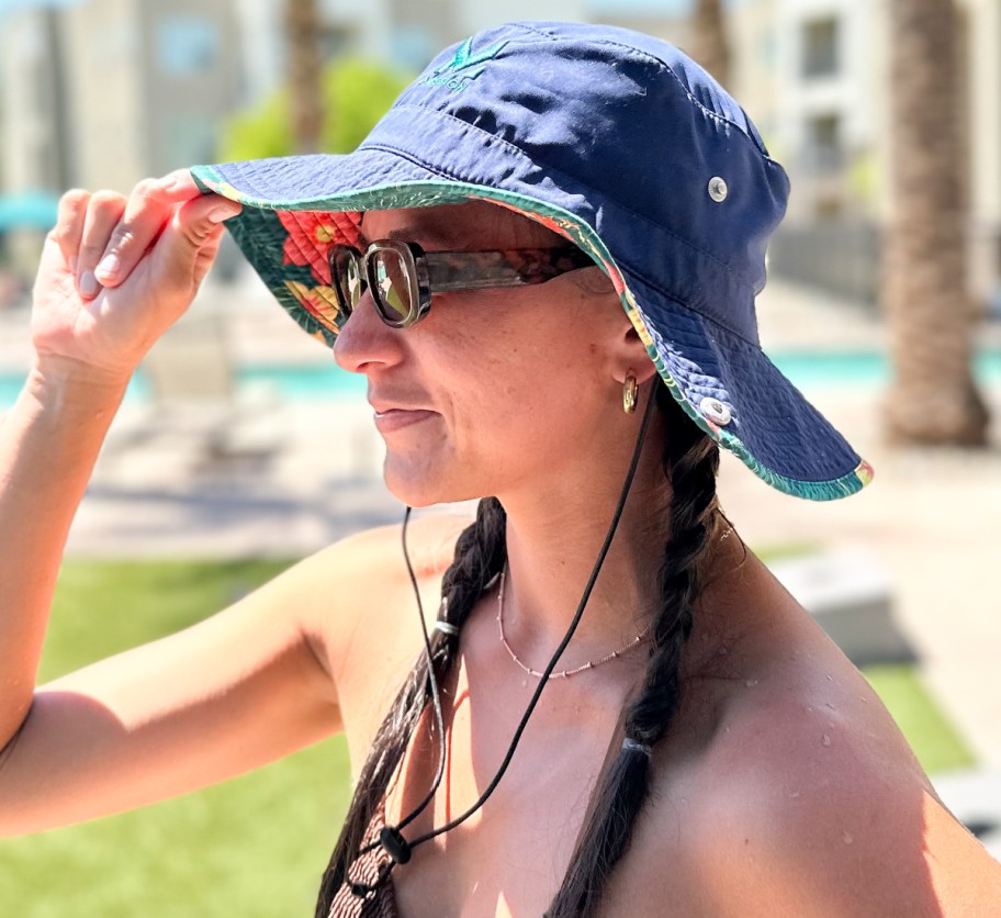 woman wearing blue bucket hat